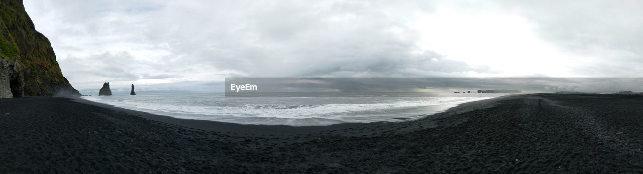 Panoramic view of beach against sky