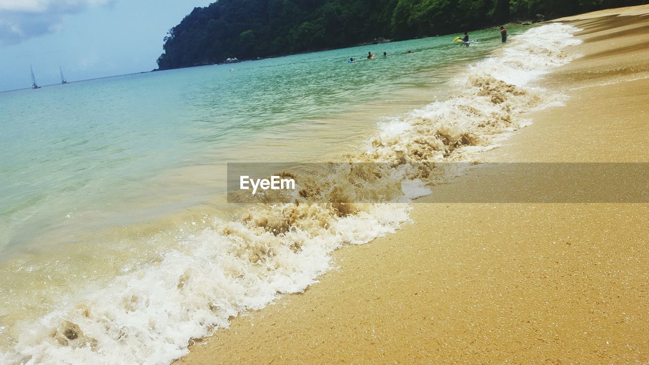 Scenic view of beach against sky