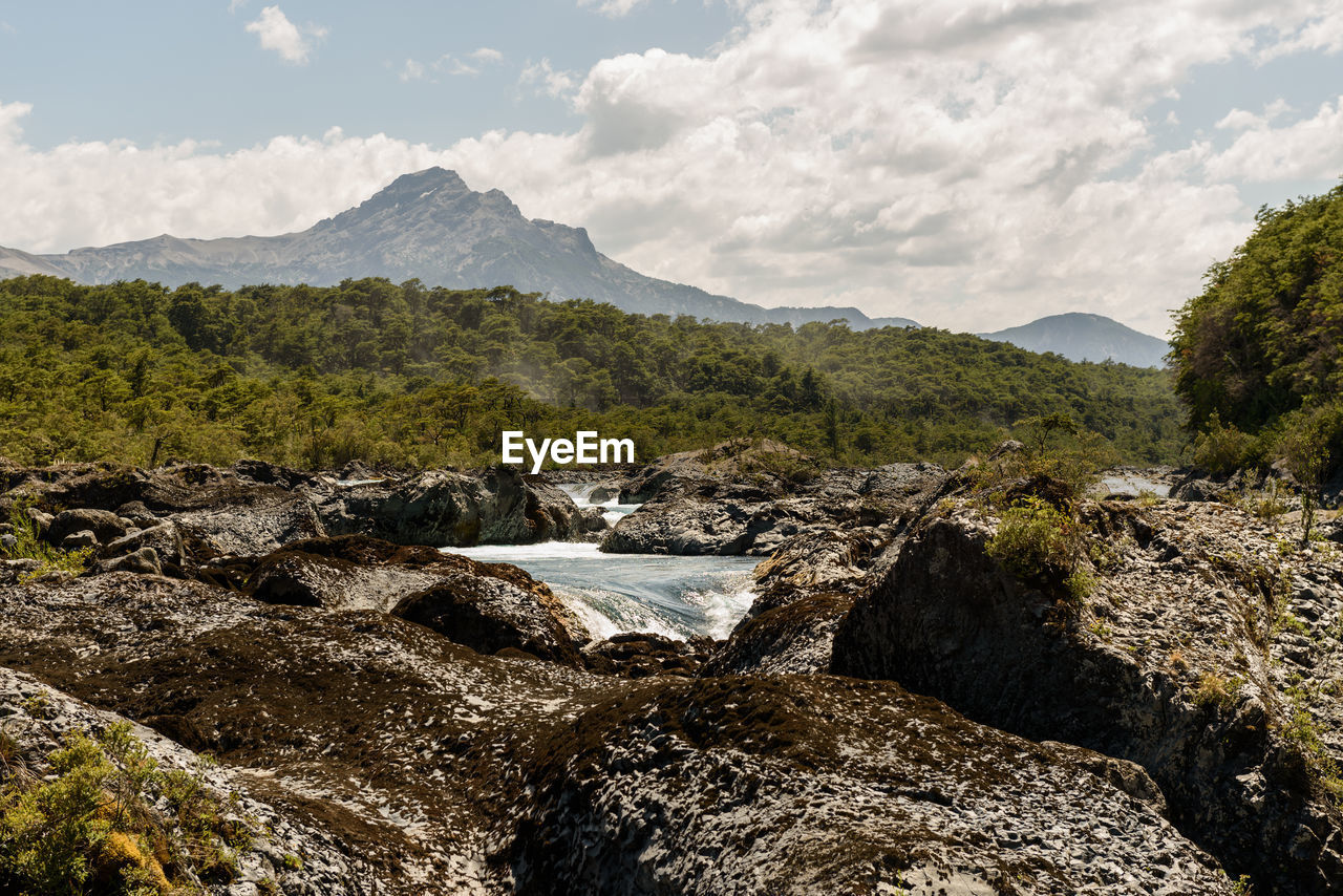 SCENIC VIEW OF ROCKS AGAINST SKY