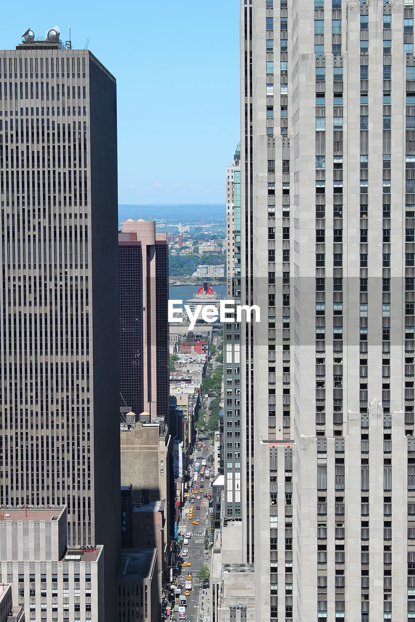 Modern buildings in city against sky