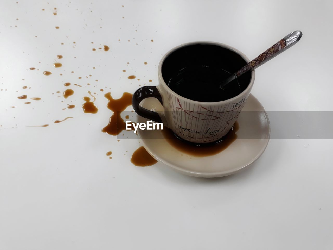 CLOSE-UP OF COFFEE ON TABLE