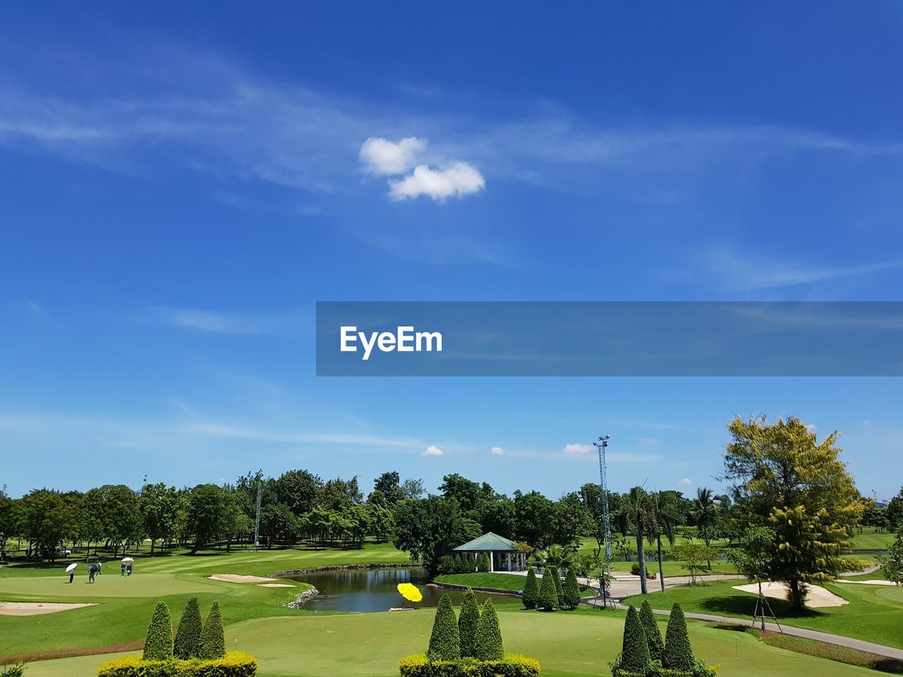 SCENIC VIEW OF GOLF COURSE AGAINST SKY