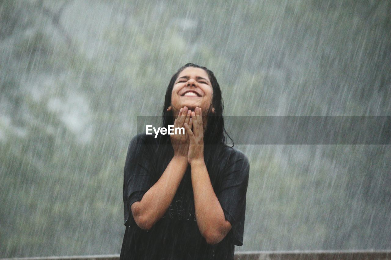 Young woman in rain