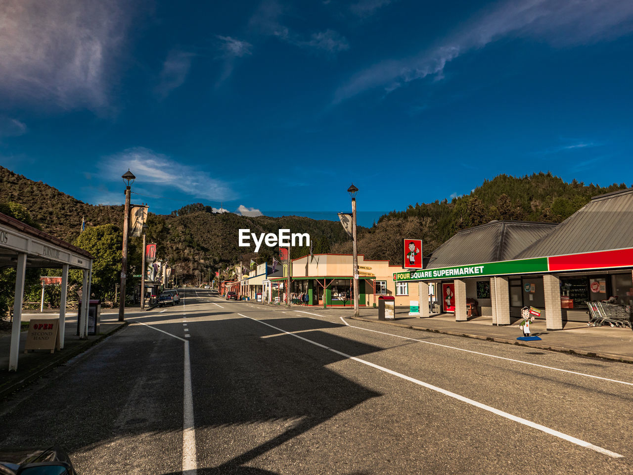 View of city street against sky