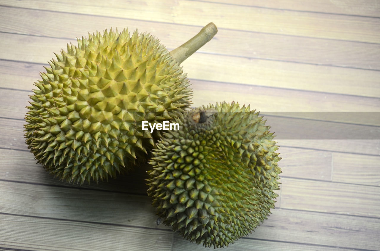 Durian fruits on wooden table background