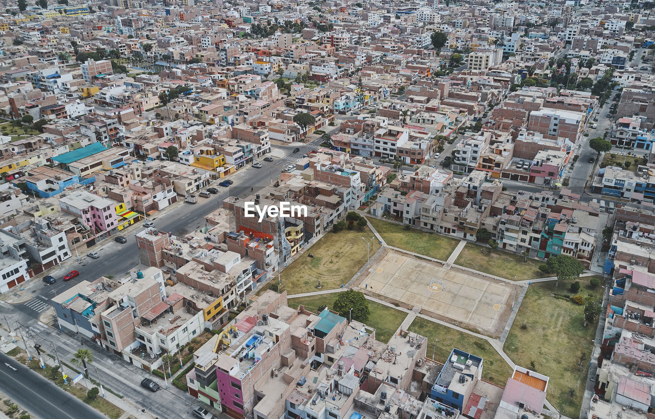 Aerial view of the football field in the middle of a messy neighborhood, callao, lima. peru