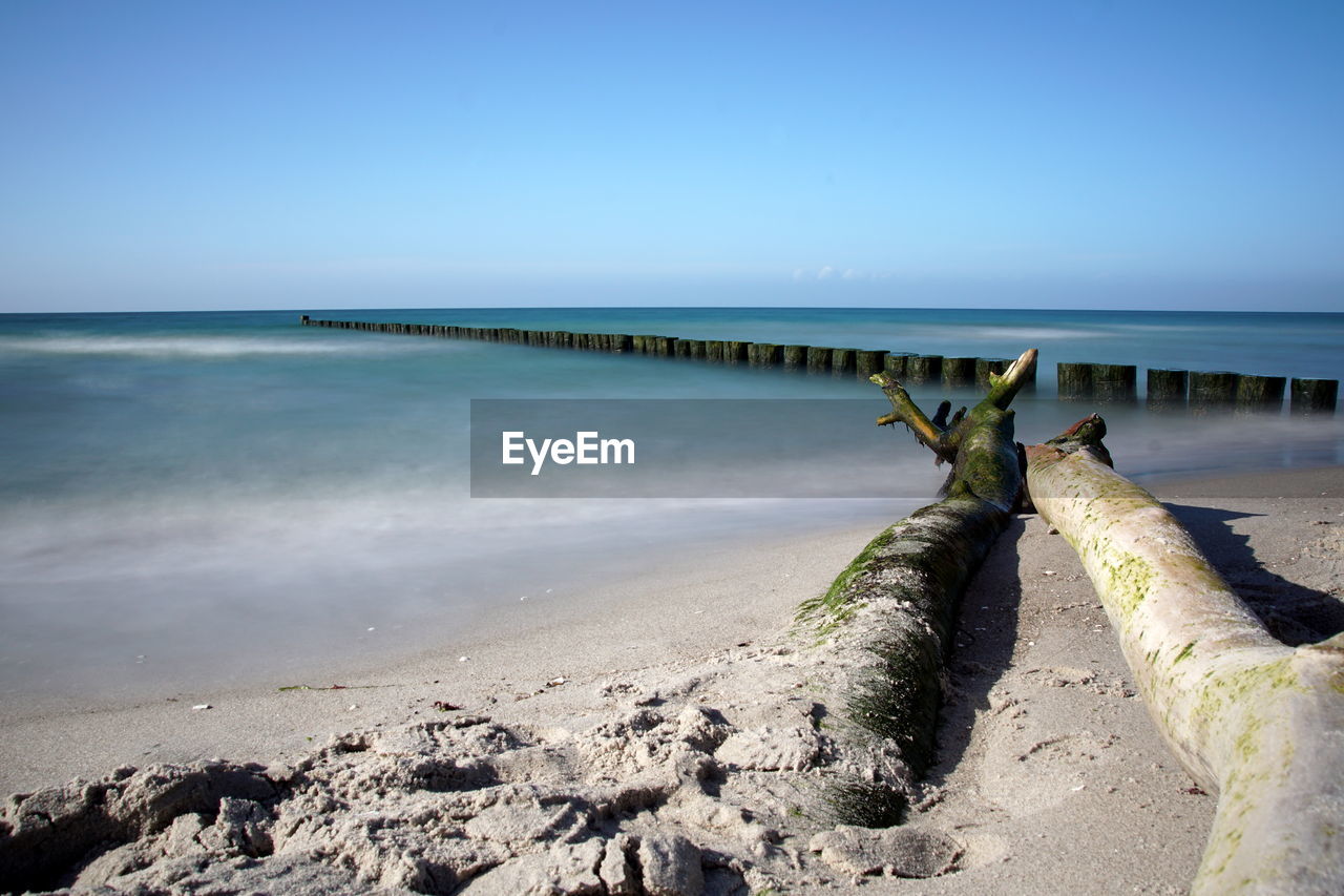 Scenic view of sea against clear sky