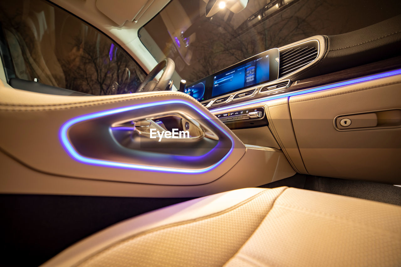 Moscow, russia - 24.12.2019 lilac led ambientlight leather interior of premium suv mercedes gls