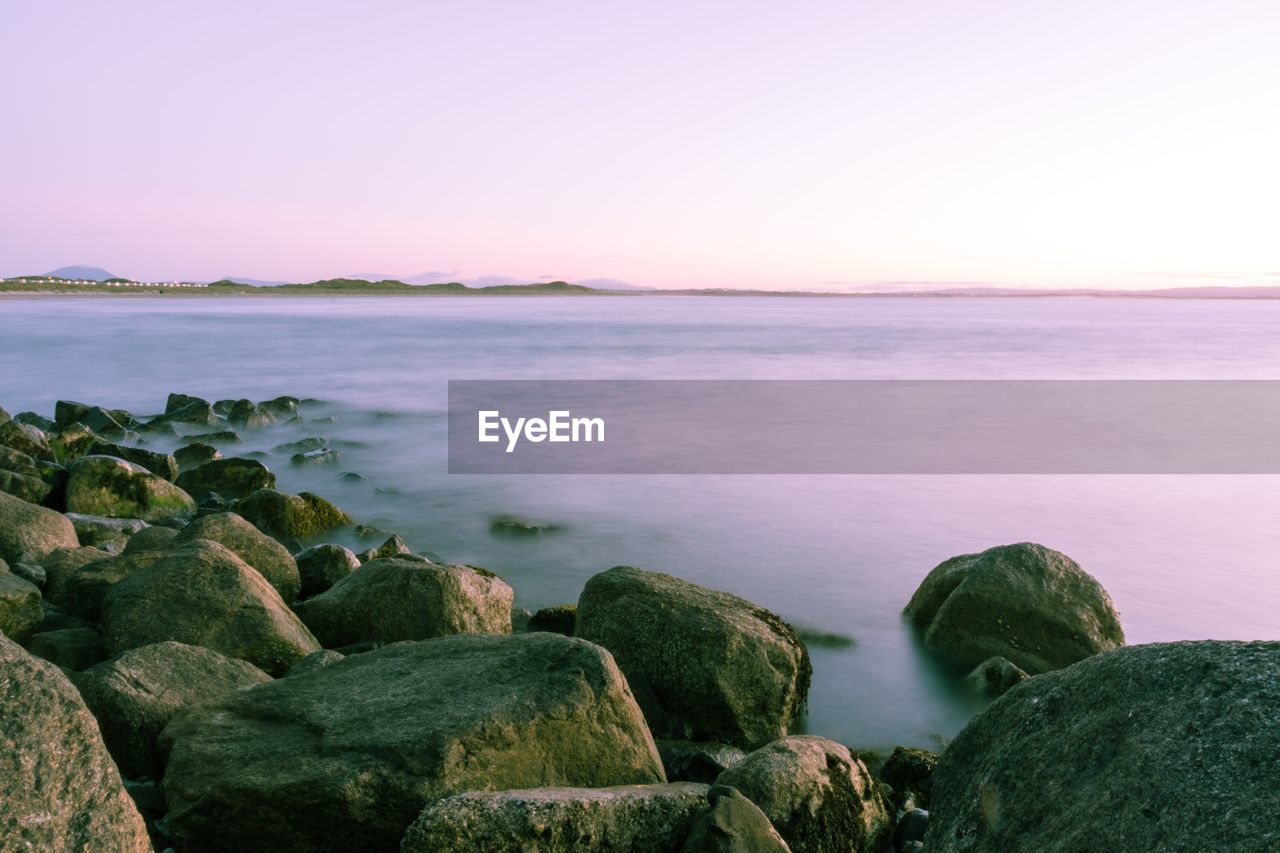 Scenic view of sea against clear sky