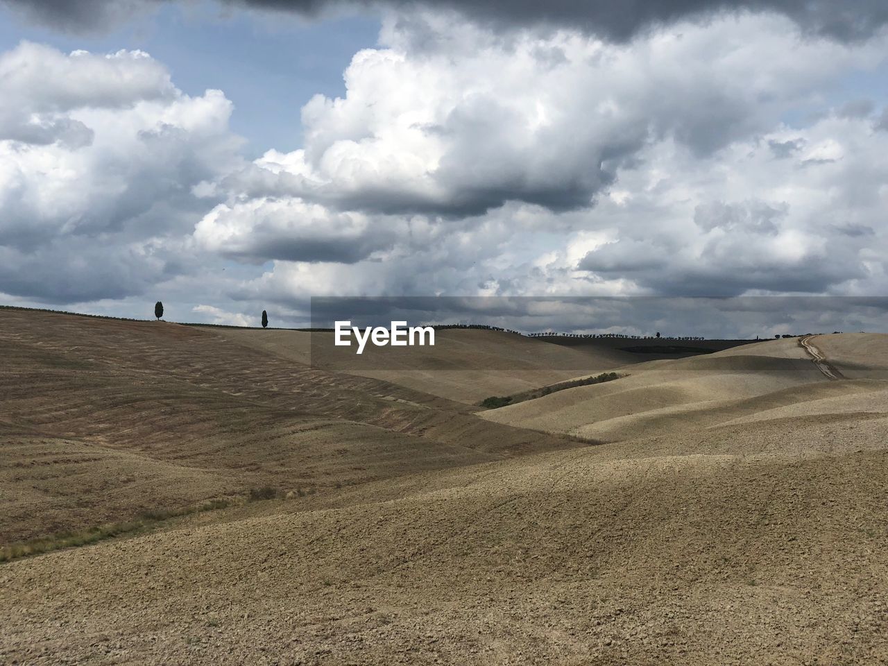 Scenic view of land against sky