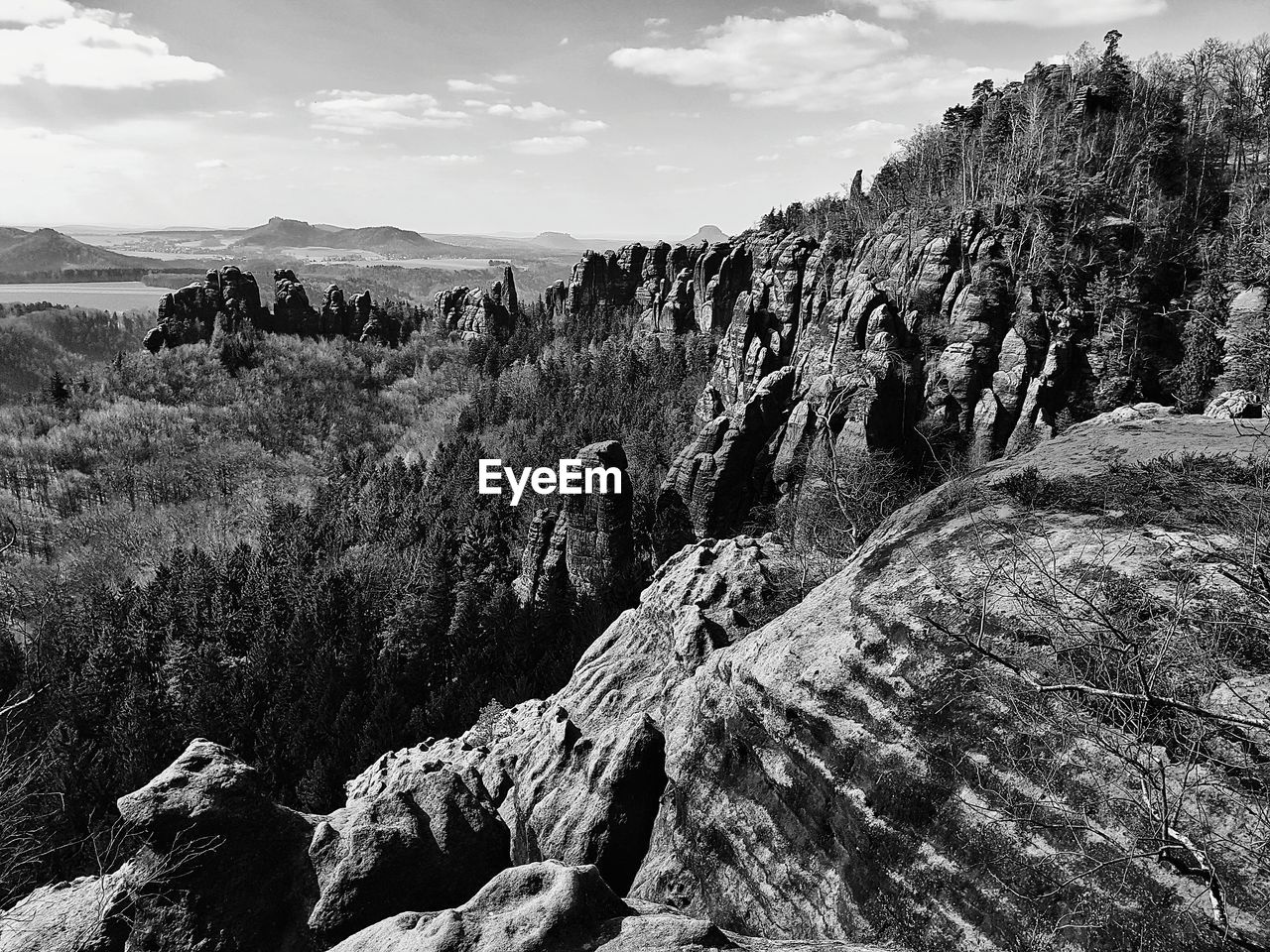 Black and white landscape photo of a mountain range