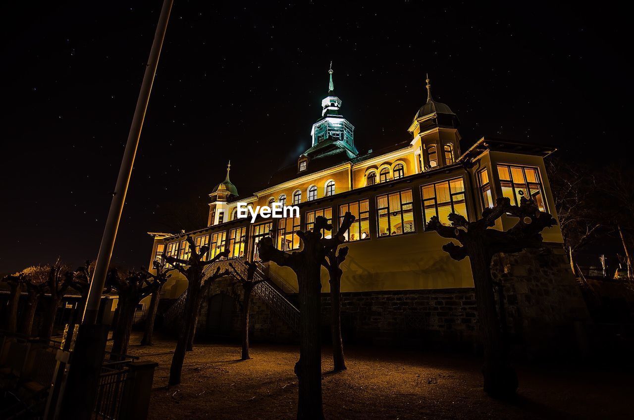 ILLUMINATED BUILDINGS AT NIGHT