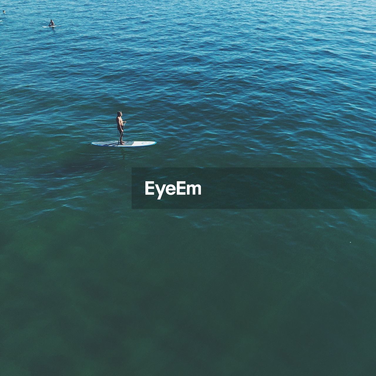 High angle view of man surfing at sea