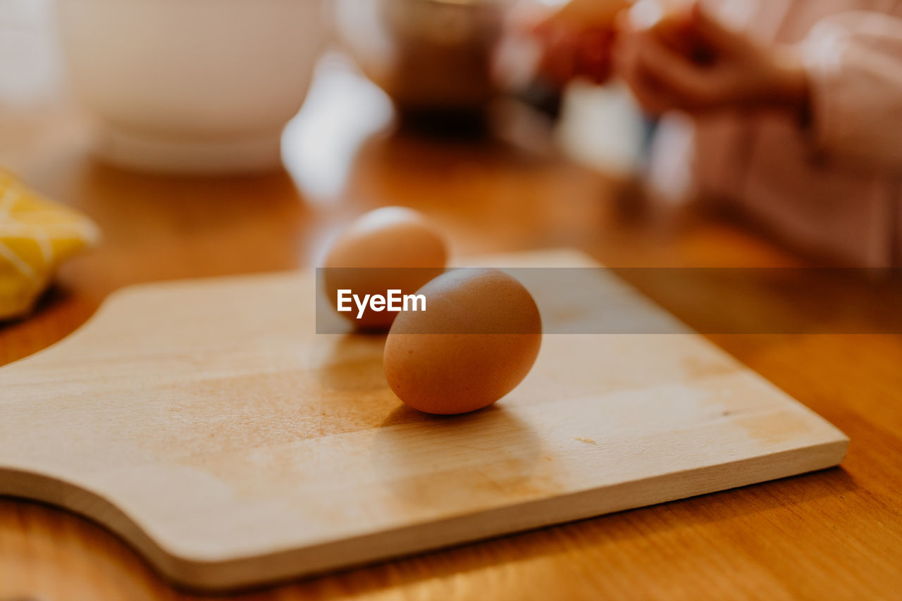 Eggs on wood cutting board