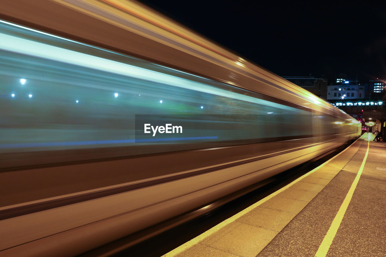 Blurred motion of train at station