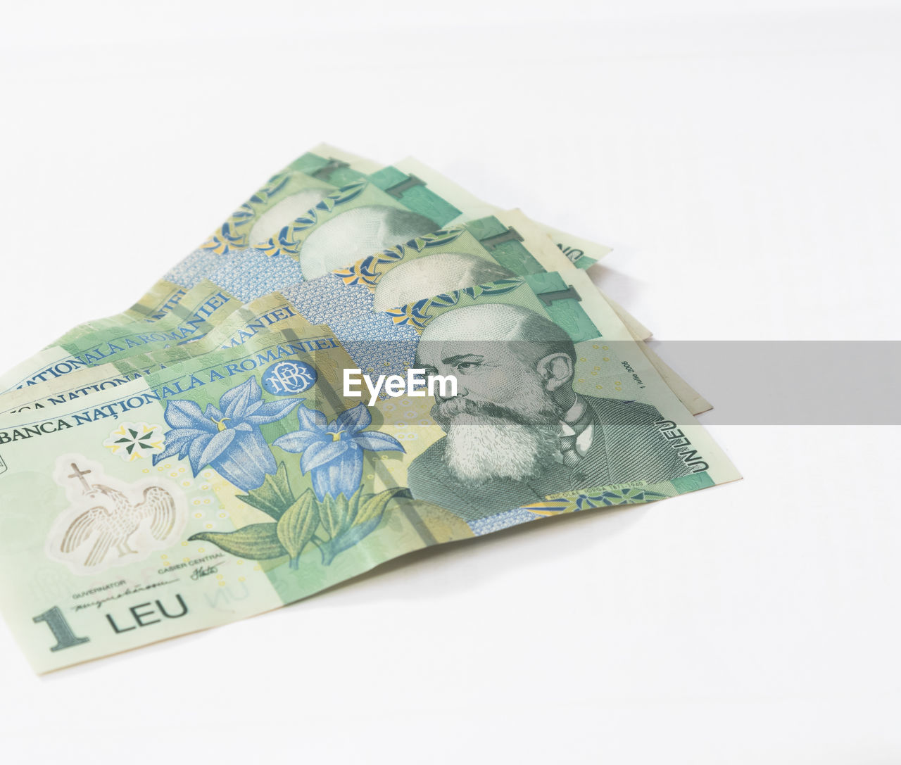 Close-up of paper currency on white background