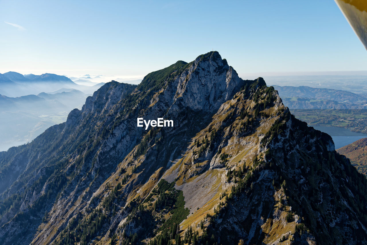 PANORAMIC VIEW OF MOUNTAINS AGAINST SKY