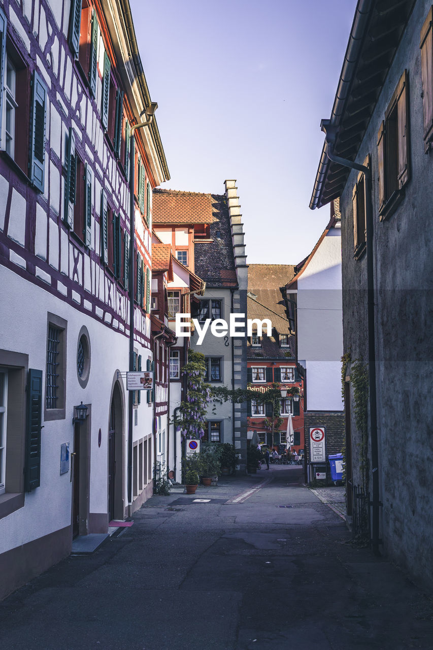 Street amidst buildings against sky