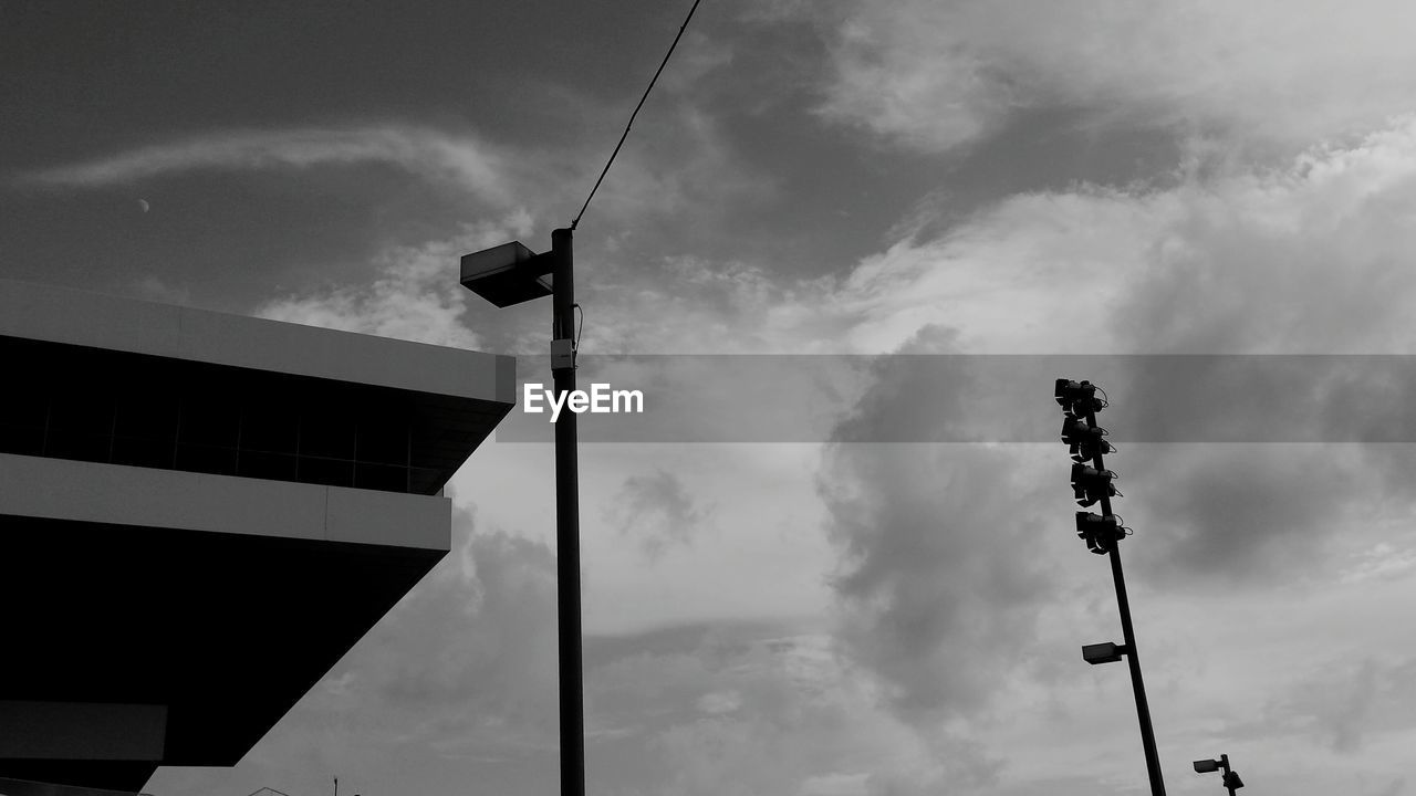 Low angle view of street light against sky