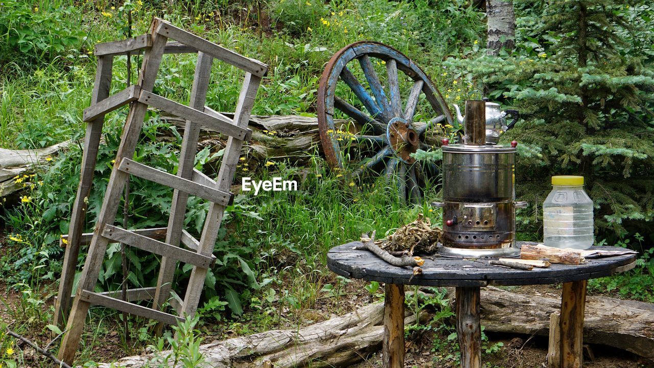 Old wooden table and chairs in yard