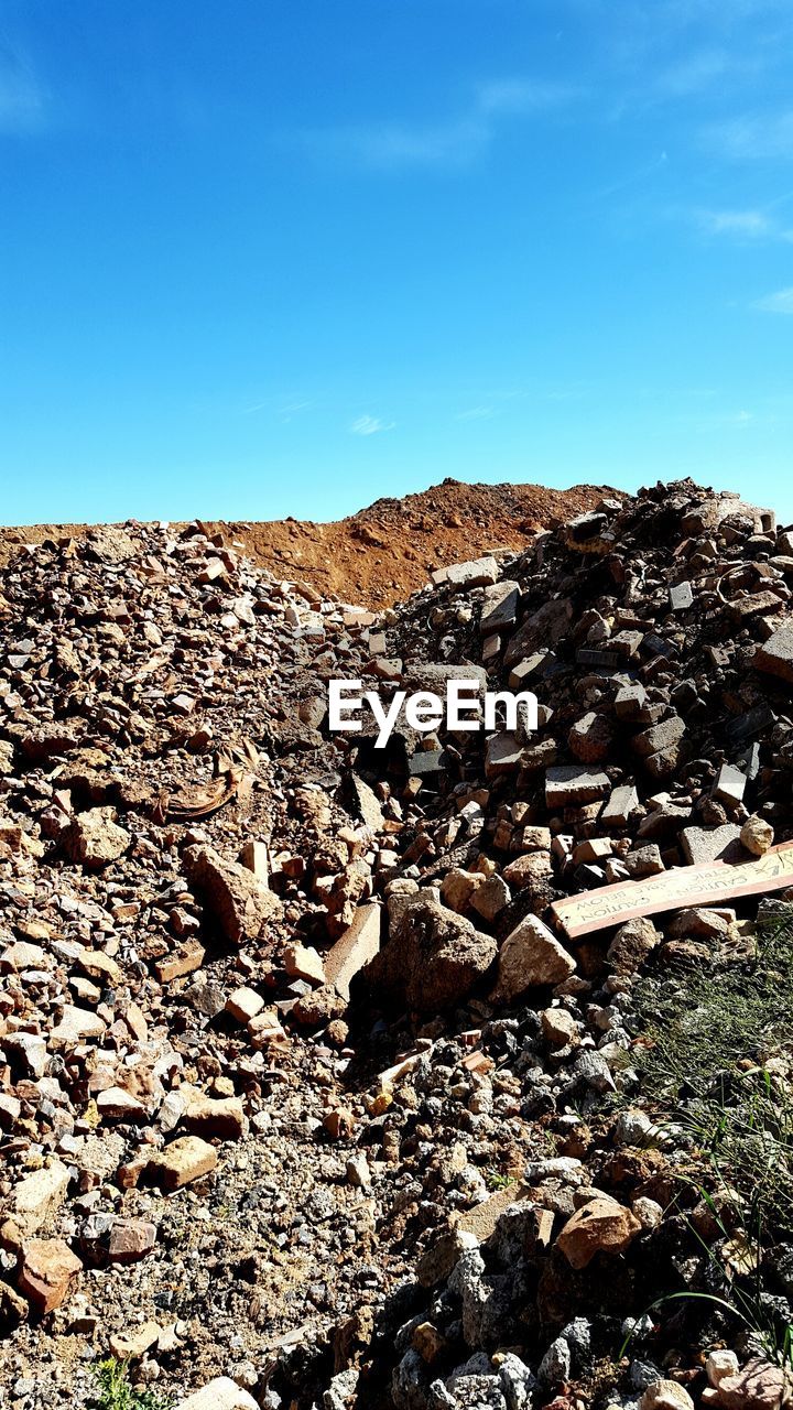 SCENIC VIEW OF ROCKY MOUNTAINS AGAINST SKY