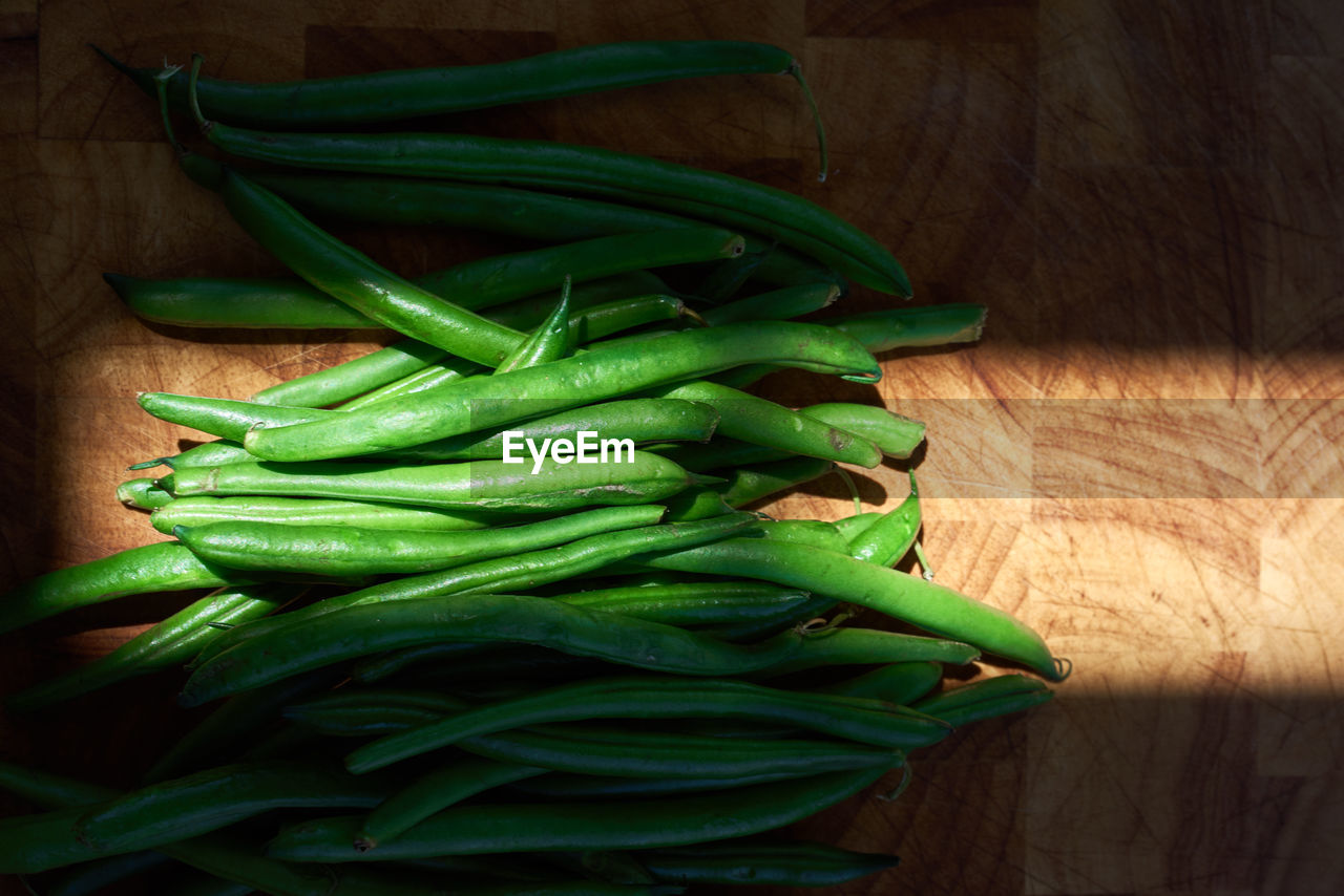 High angle view of green beans on table