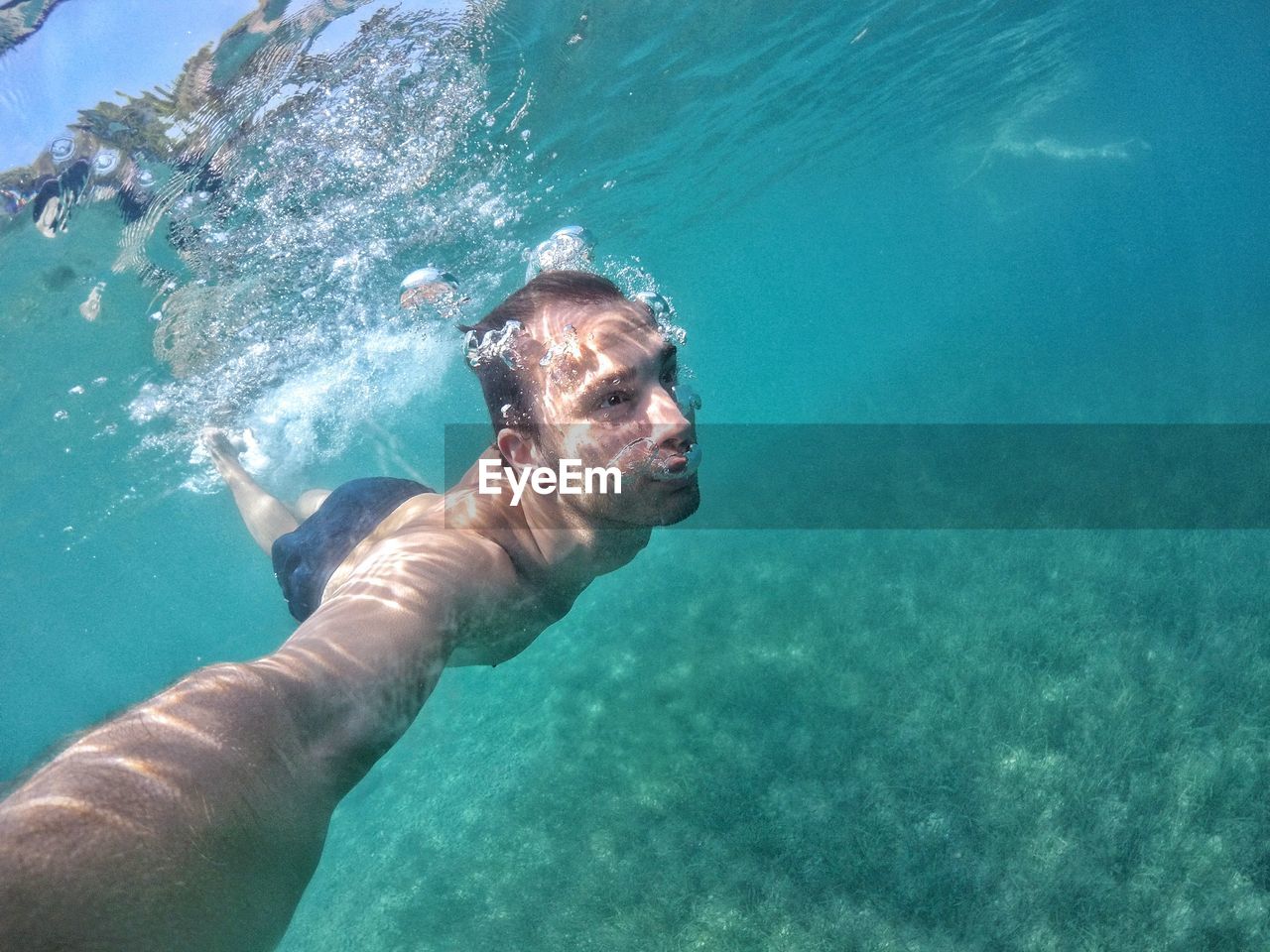 Man swimming in undersea