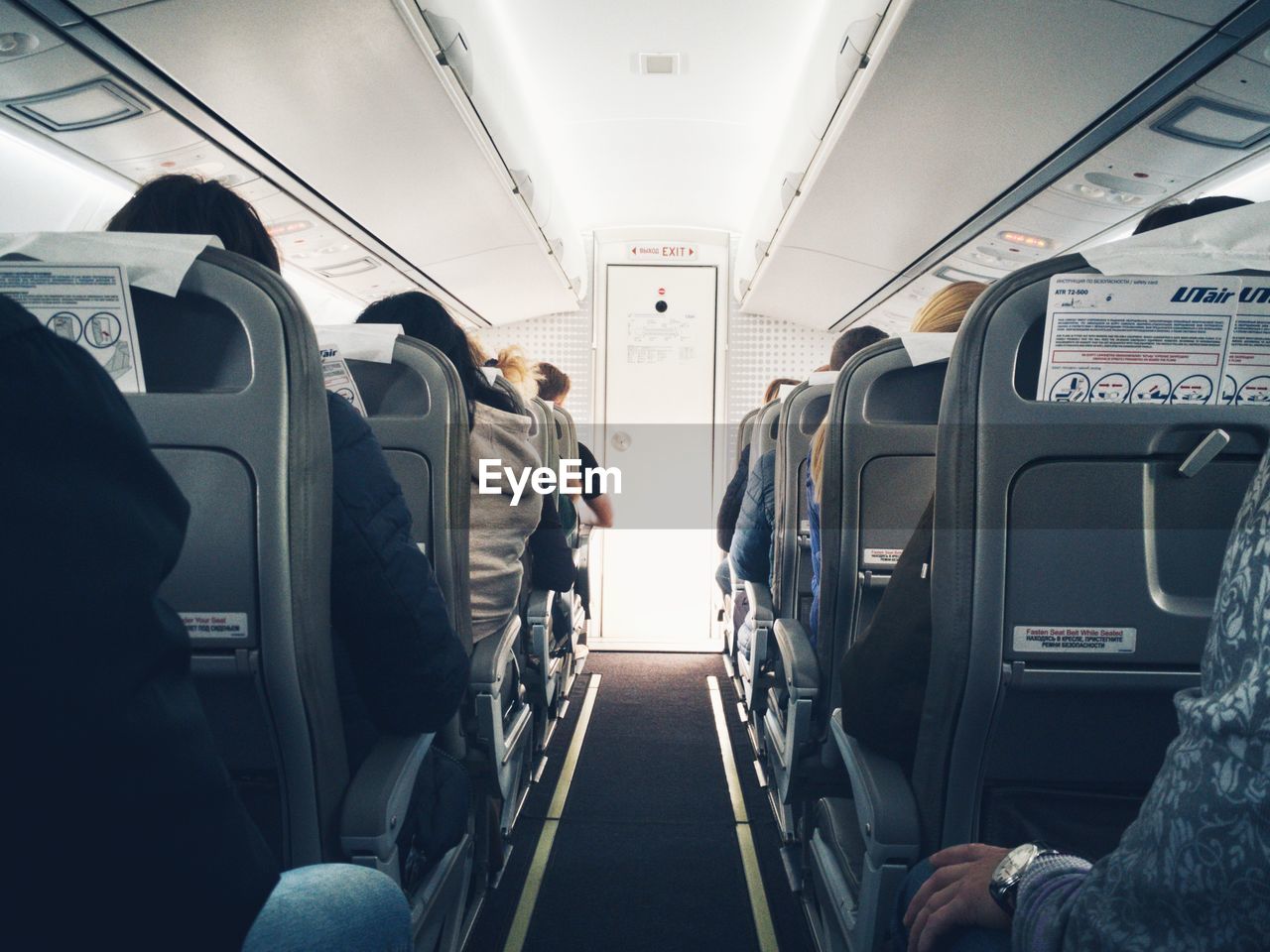 People sitting in airplane