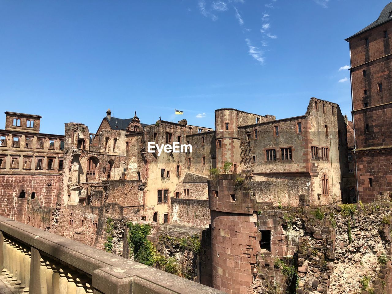 Low angle view of historical building against blue sky