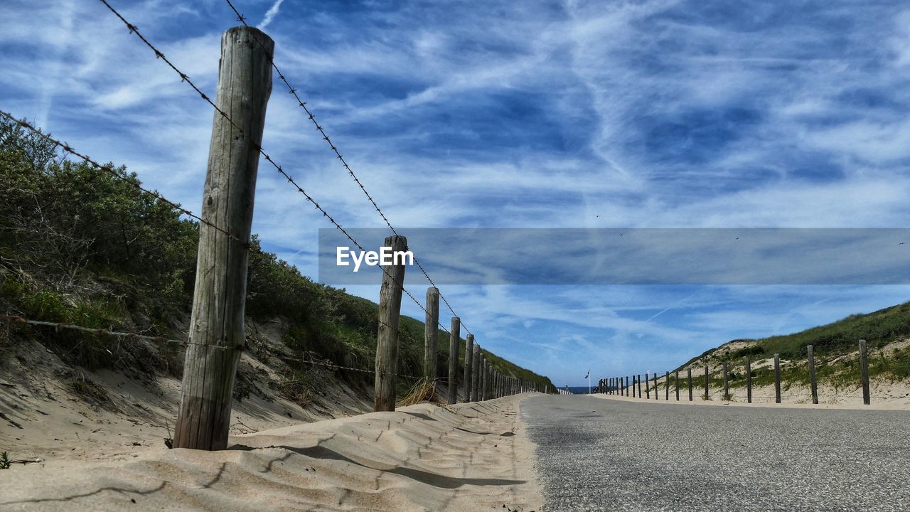 PANORAMIC SHOT OF ROAD AGAINST SKY