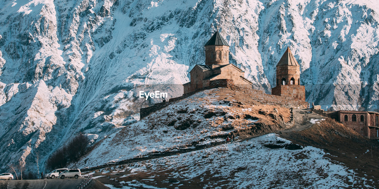 scenic view of snowcapped mountains during winter