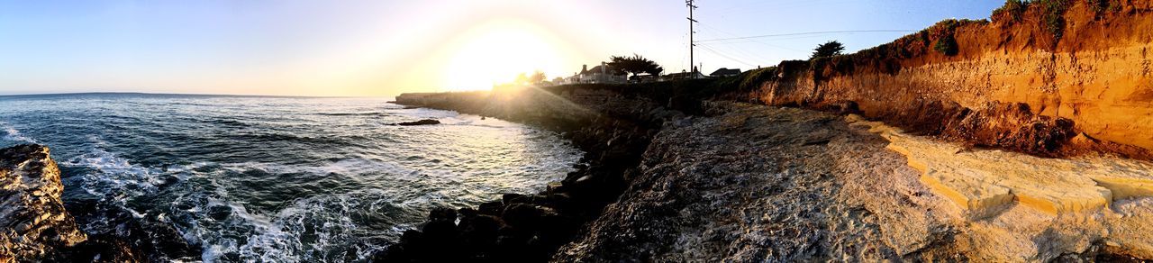 Scenic view of sea against sky at sunset