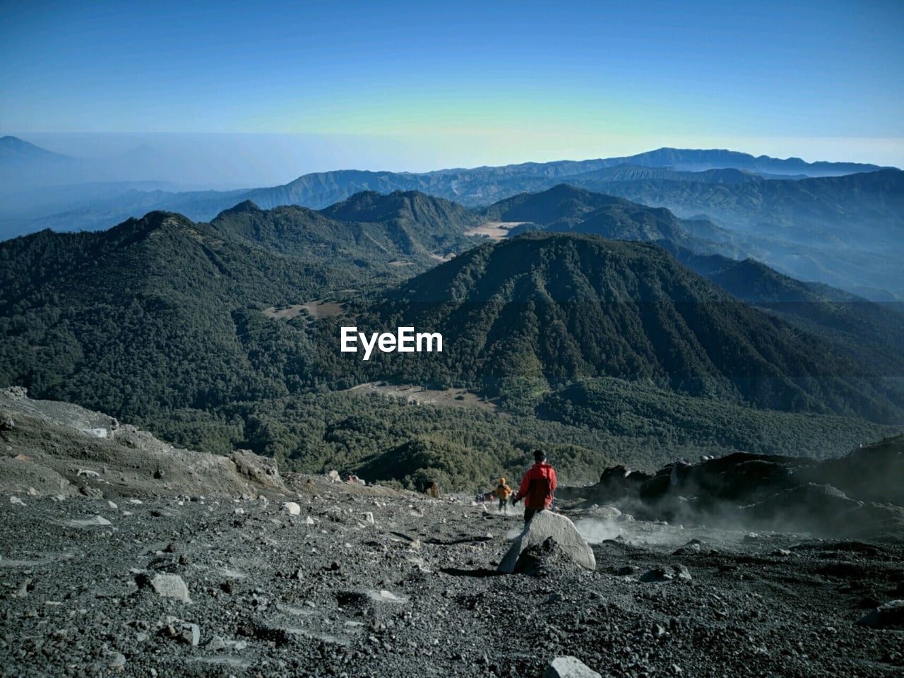 Man looking at mountains