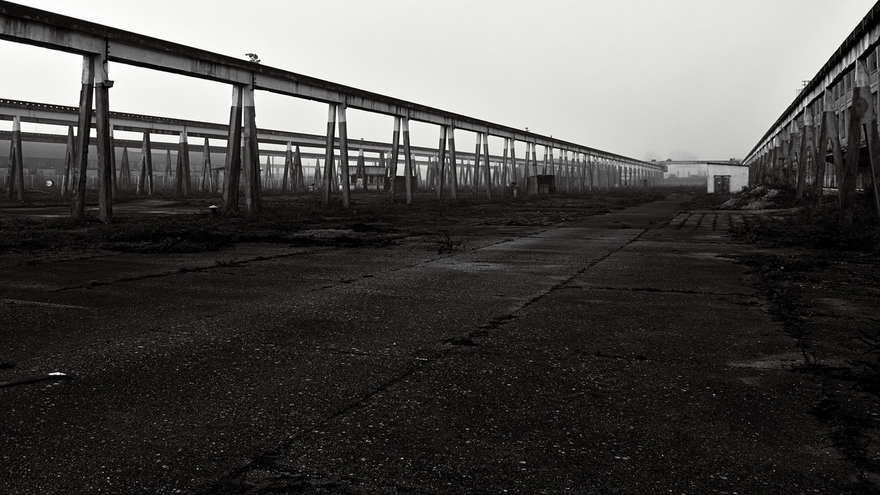 SURFACE LEVEL OF RAILWAY TRACKS AGAINST CLEAR SKY