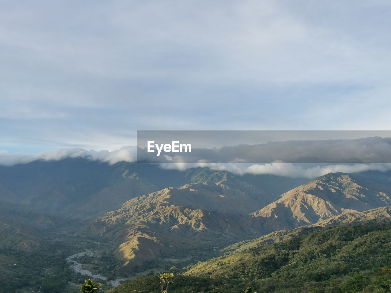 SCENIC VIEW OF LANDSCAPE AND MOUNTAINS AGAINST SKY