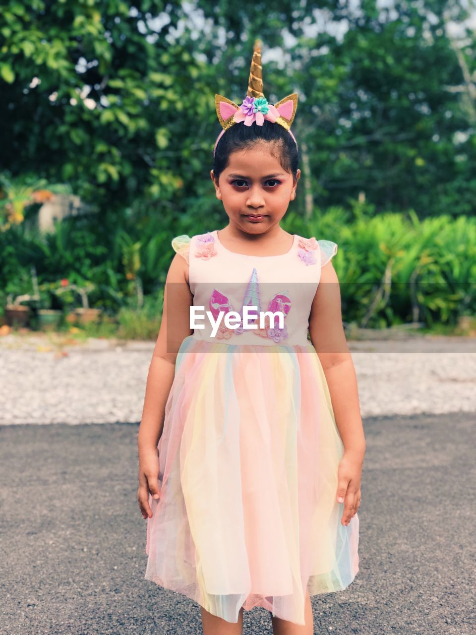 Portrait of girl standing outdoors