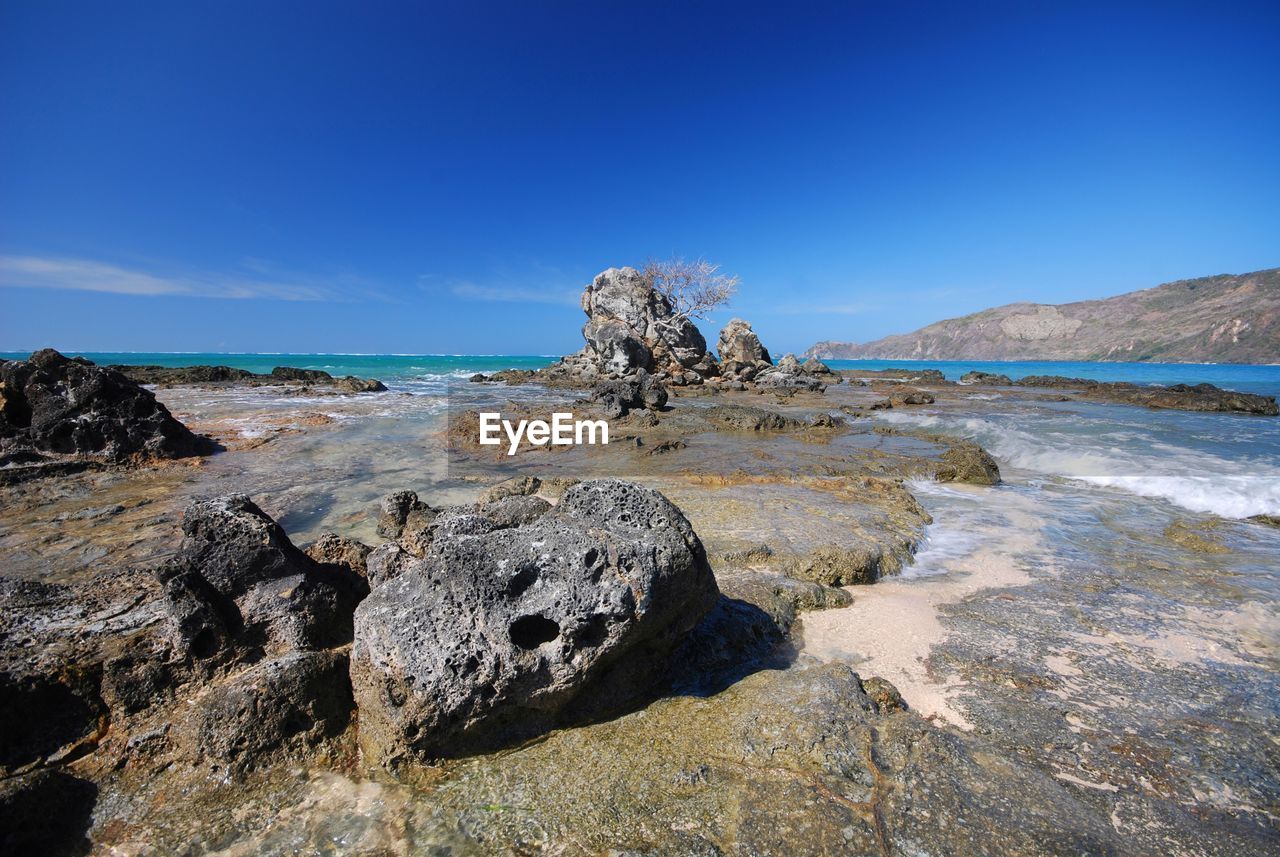 Rocks on kuta mandalika beach, lombok, west nusa tenggara, indonesia