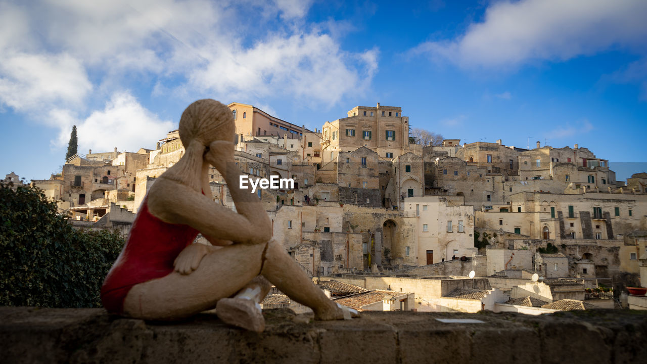 Low angle view of statue against sky