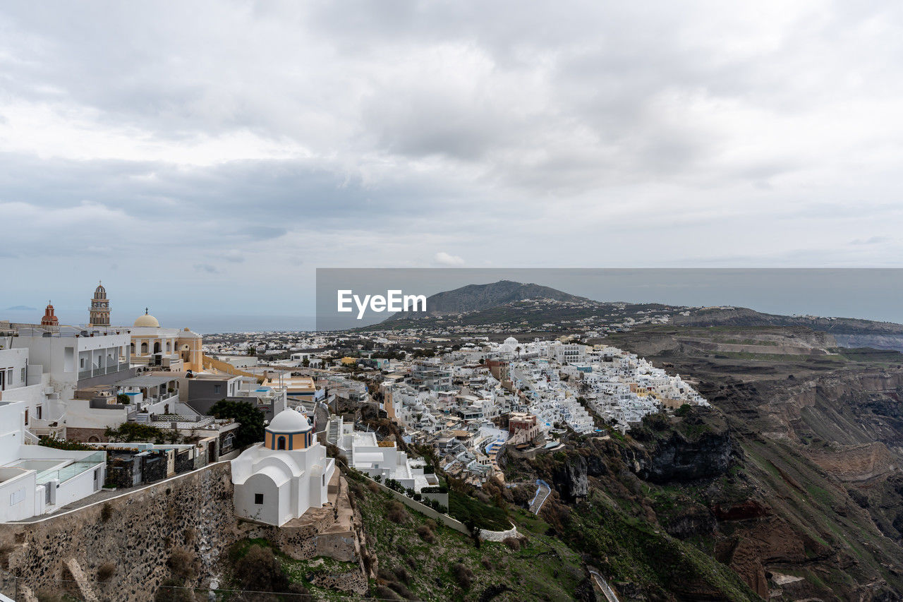 architecture, building exterior, built structure, sky, building, city, cloud, travel destinations, nature, cityscape, travel, tourism, high angle view, town, landscape, mountain, environment, history, religion, the past, no people, land, sea, scenics - nature, outdoors, place of worship, coast, residential district, day, vacation, water, beauty in nature, mountain range, aerial photography, house, belief, spirituality