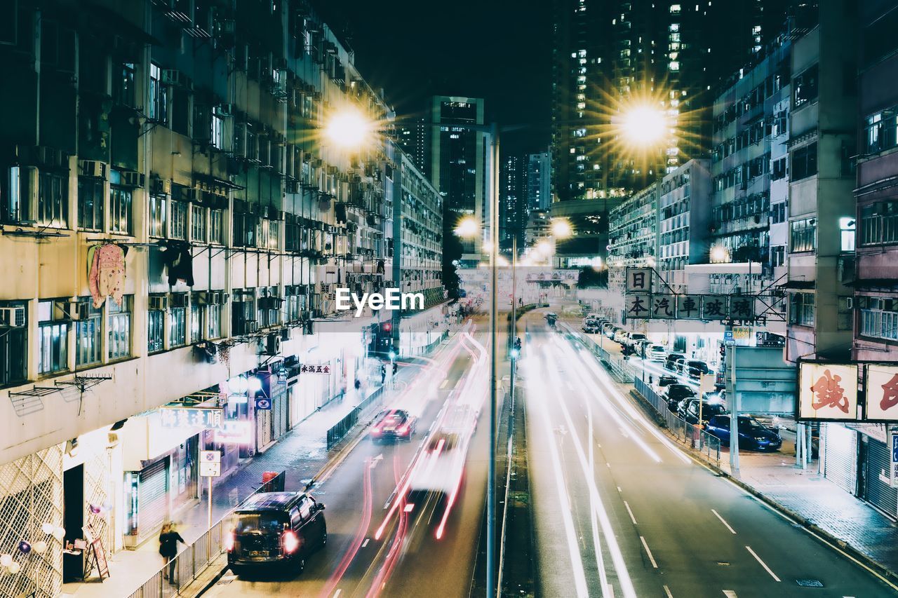 Traffic on road in city at night