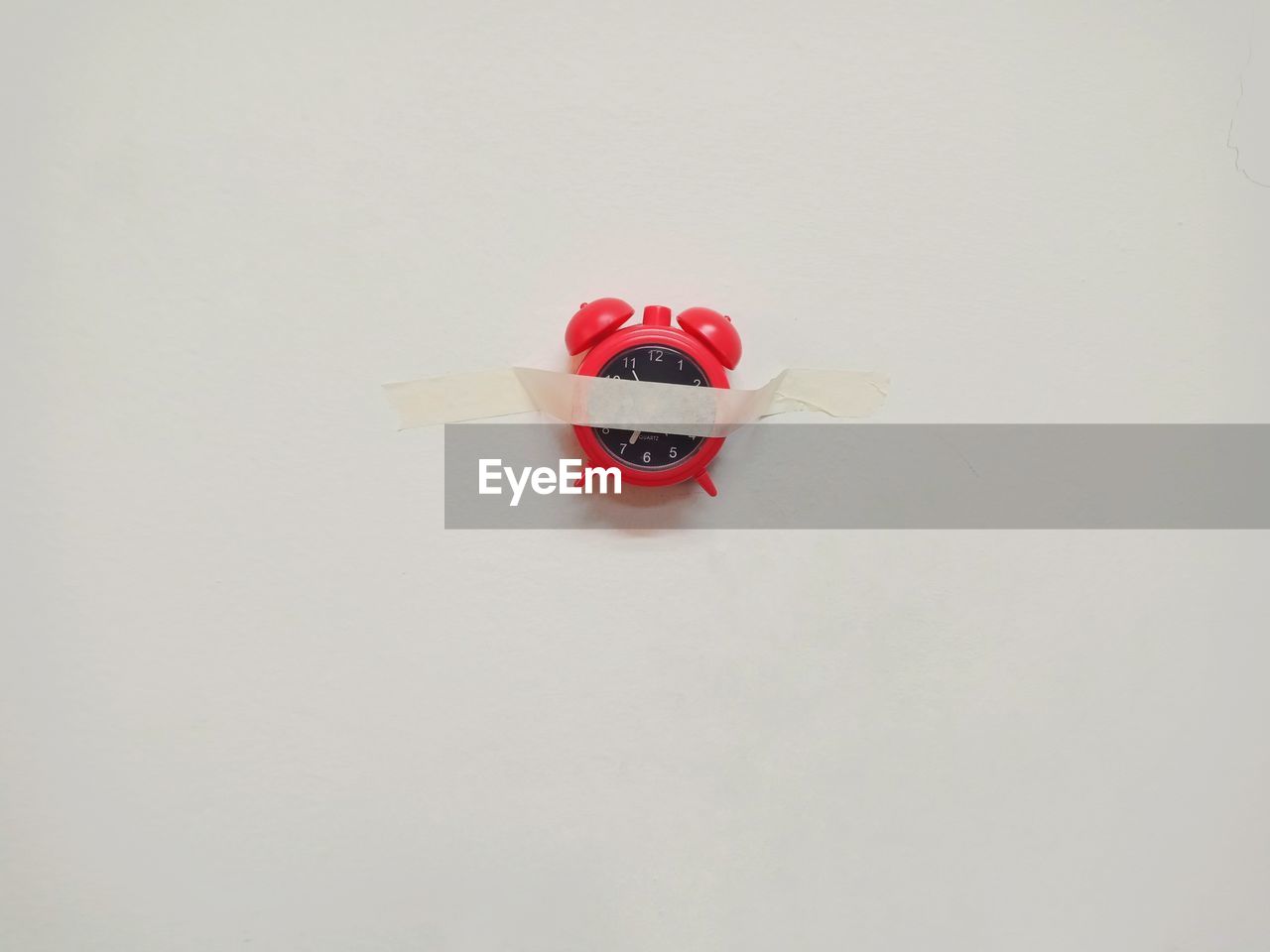 HIGH ANGLE VIEW OF RED TOY ON WHITE BACKGROUND