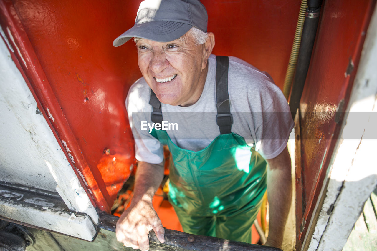 Fisherman working on trawler