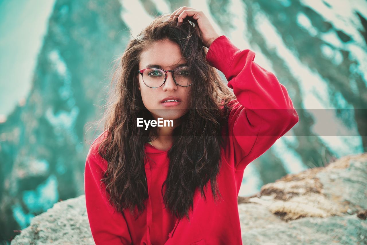 Portrait of young woman wearing eyeglasses