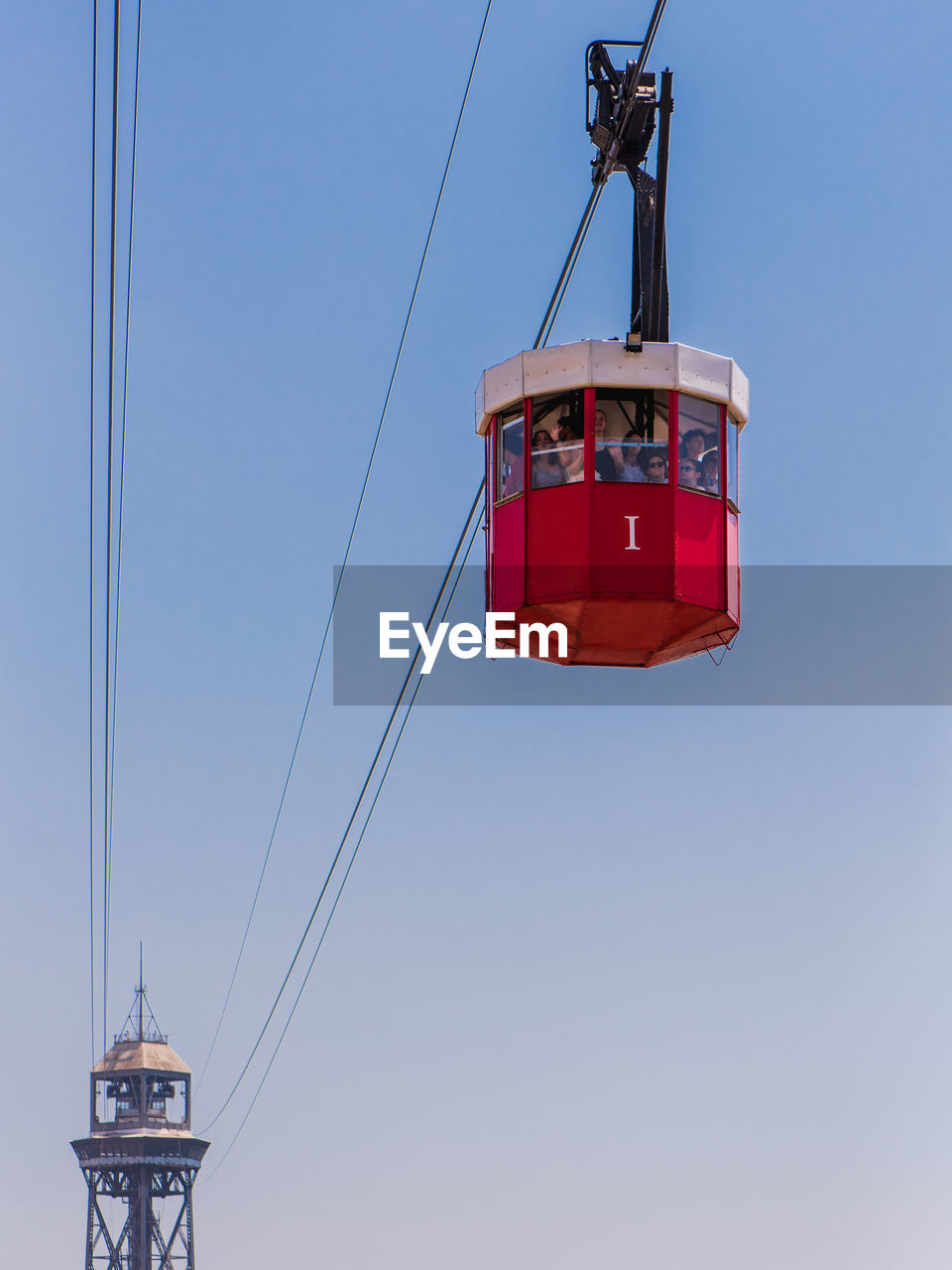 LOW ANGLE VIEW OF CABLES AGAINST CLEAR SKY