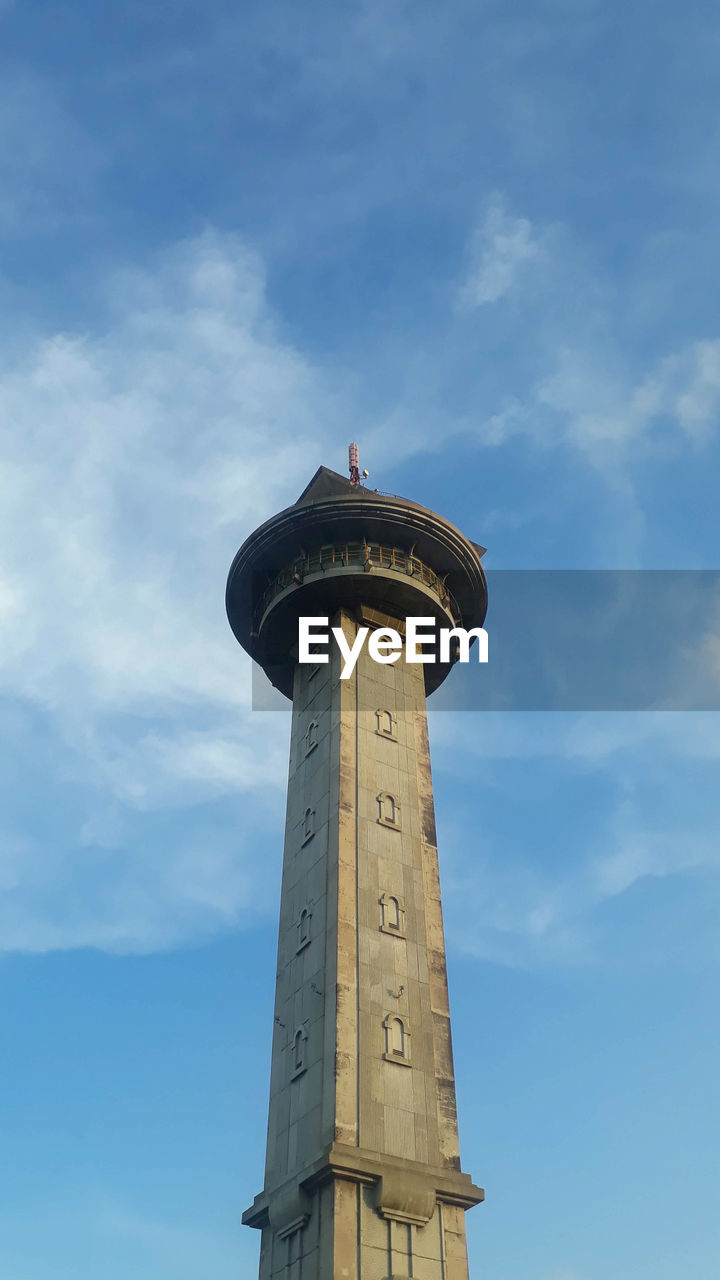 architecture, sky, tower, built structure, low angle view, cloud, blue, building exterior, day, nature, no people, travel destinations, lighthouse, history, travel, the past, outdoors, city, building, guidance, observation tower, tourism