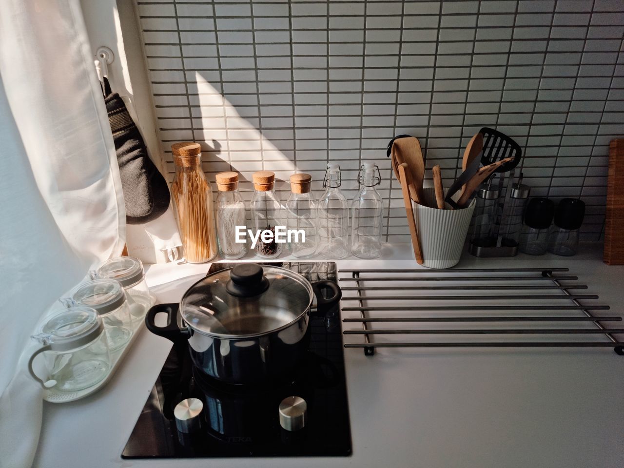 High angle view of container on stove at kitchen