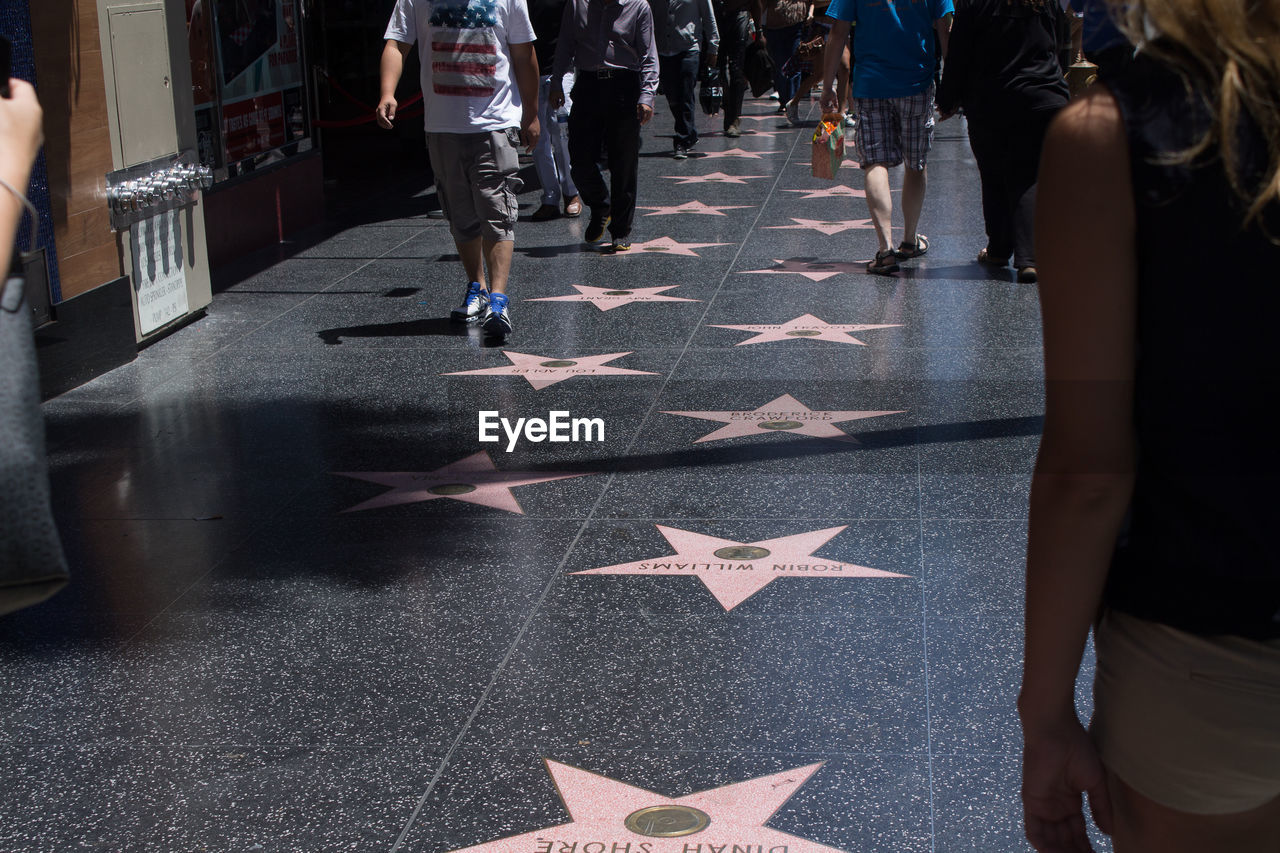 People walking on sidewalk