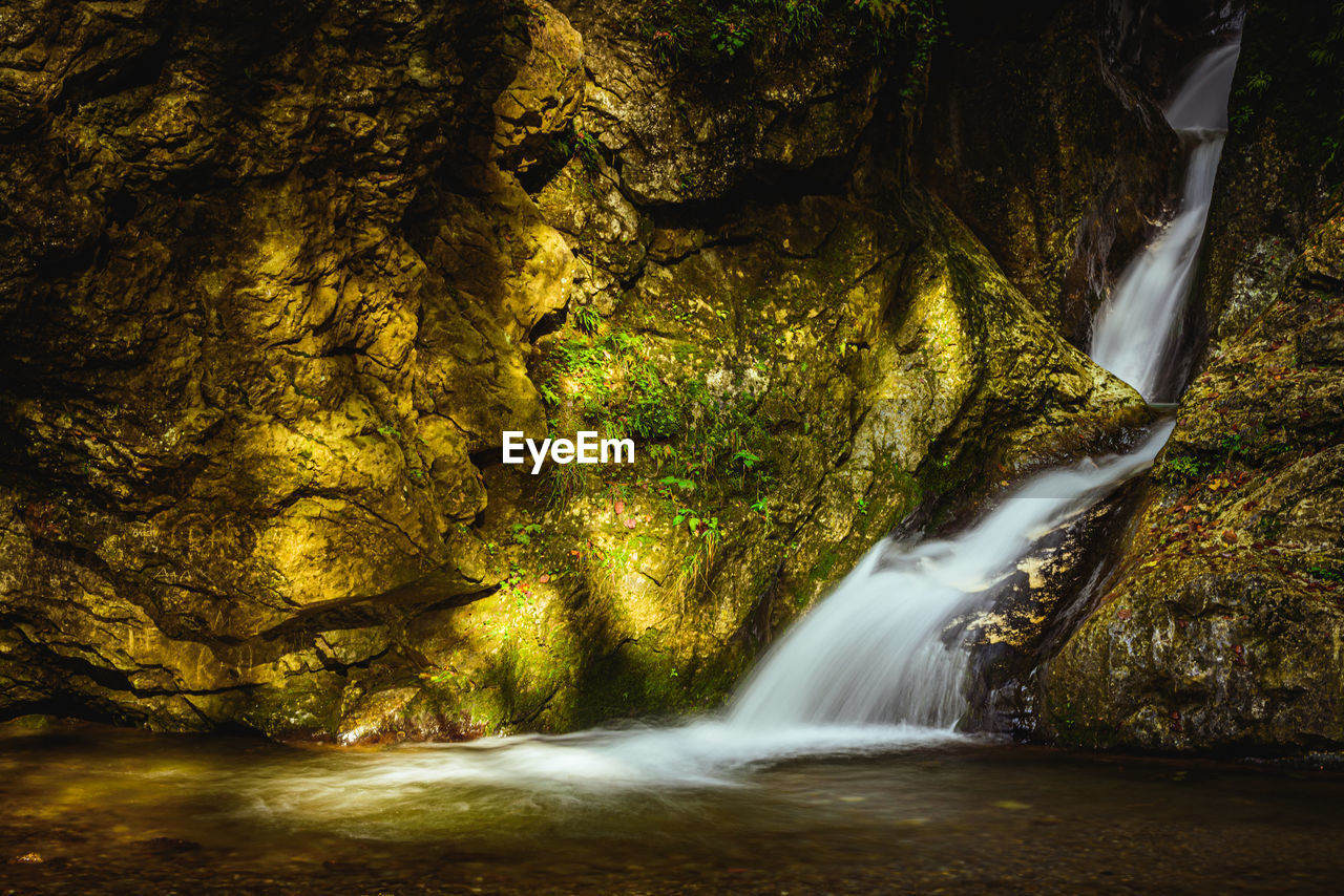 Autumn at kesselfallklamm waterfalls in semriach region graz, styria. hiking spot for recreation.