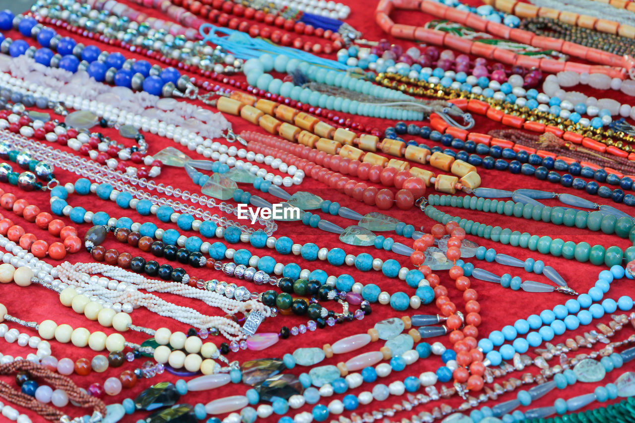 Full frame shot of multi colored necklace at market for sale