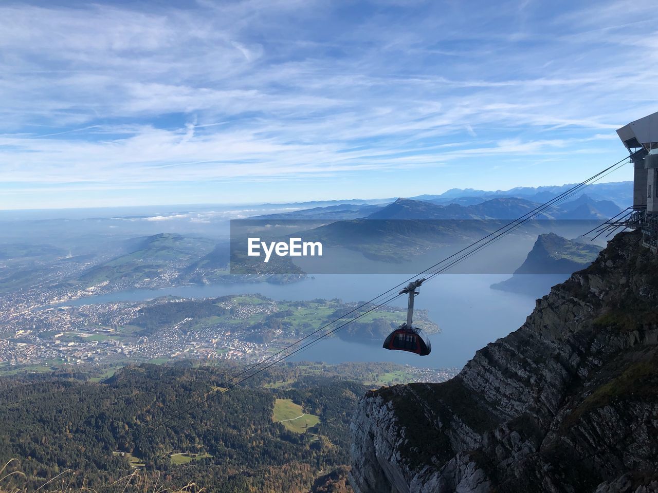 SCENIC VIEW OF LANDSCAPE AND MOUNTAINS AGAINST SKY